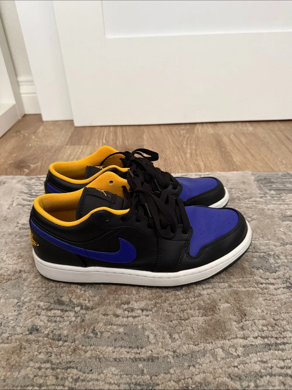 Jordan 1 Low-Top Sneakers in Black, Royal Blue & Yellow